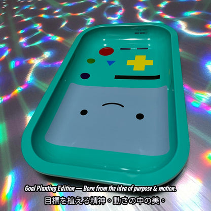 CARTOON ROLLING tray with cartoon face design on a colorful, reflective background